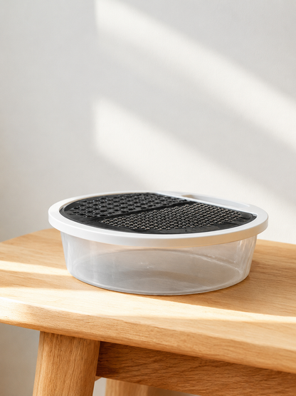 The Helpful 2-in-1 Steel Grater With Storage Bowl
