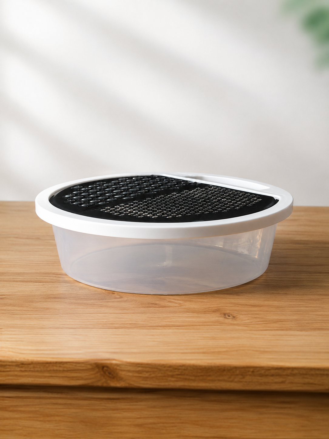 The Helpful 2-in-1 Steel Grater With Storage Bowl